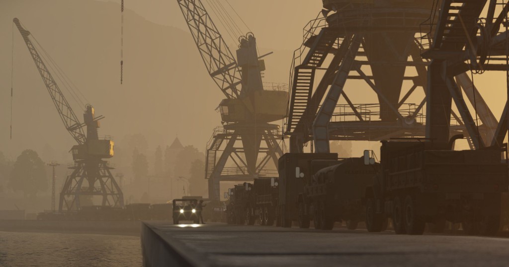 Foggy harbor with port cranes and military trucks
